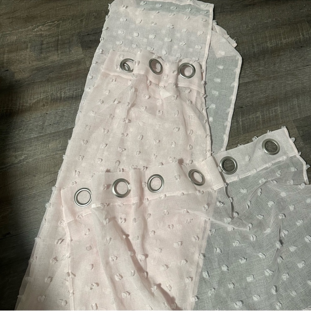 2 panels of Pink sheer curtains